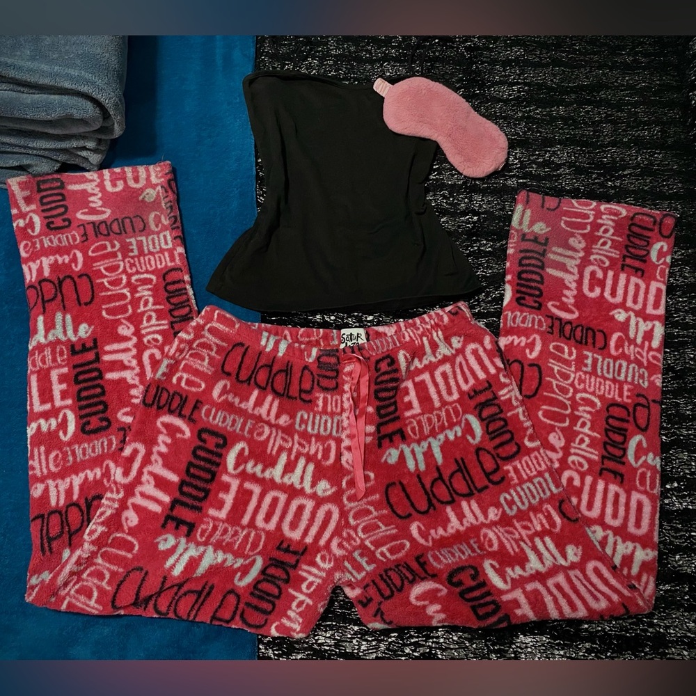 Cuddle up in these soft and comfy pink and white loungewear pajama pants